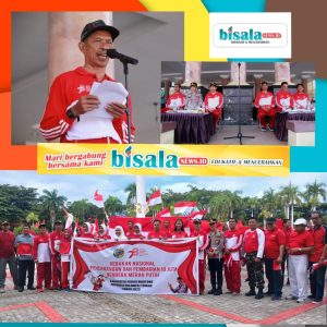 Pemkab Parimo Resmi Laksanakan Gernas Pembagian Bendera Merah Putih